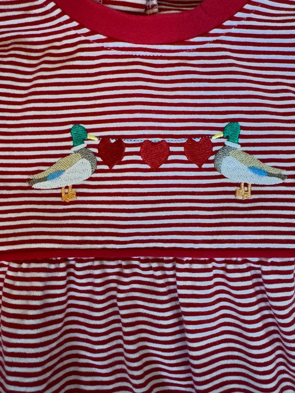NWT Jellybean 12 month romper In flawless condition.  Embroidered ducks and hear